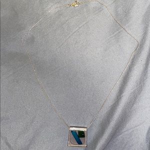 Silver Necklace with Clear square with rocks in it